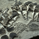 Illustration for article titled This dramatic fossil shows an ancient marine reptile giving birth